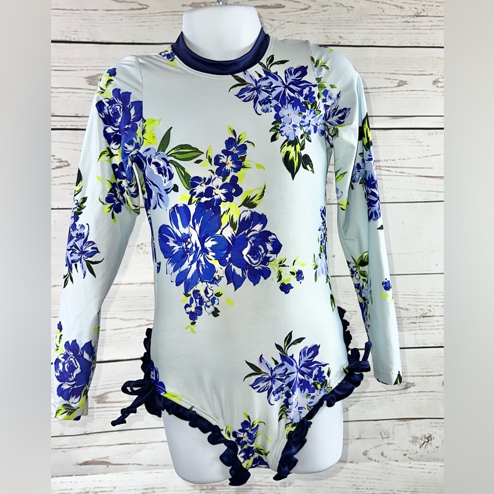 Lil Cactus, Girl’s size 7t, long-sleeve white and purple ruffle accent swimsuit